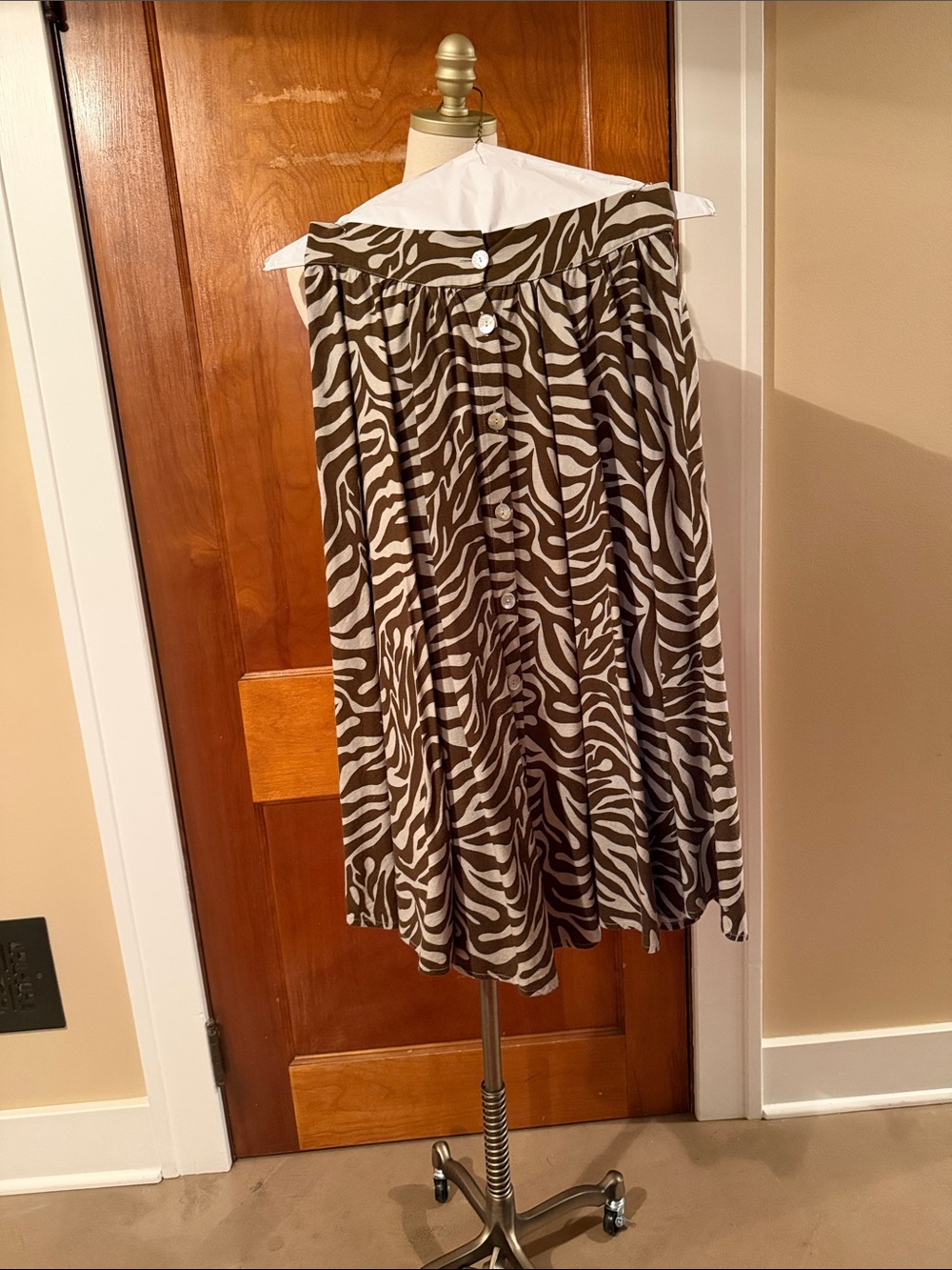 The Andamane Zebra-Print Button-Front Midi Skirt in Brown and Cream